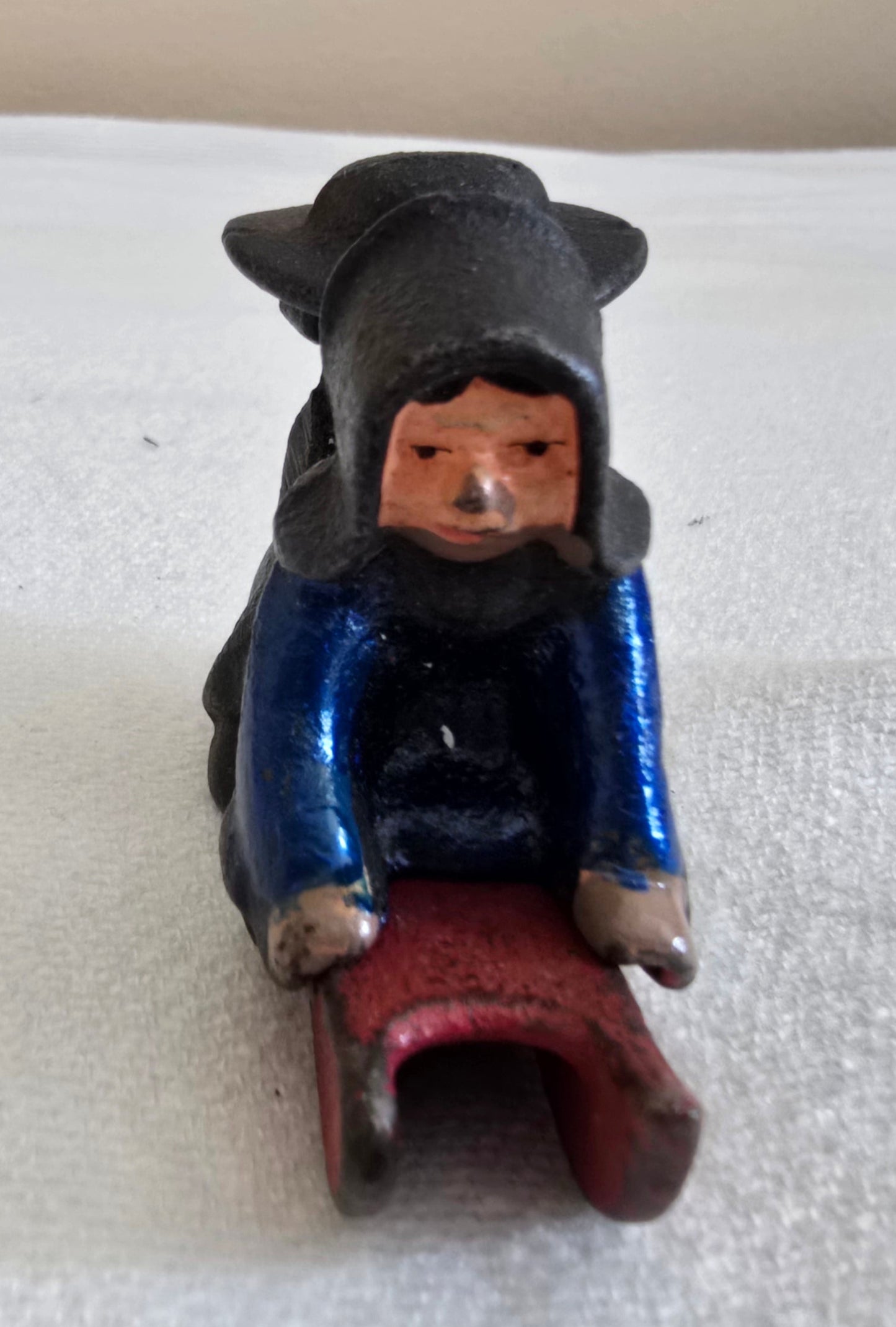 Vintage Cast Iron Amish Boy and Girl on Sled Toy Figurine