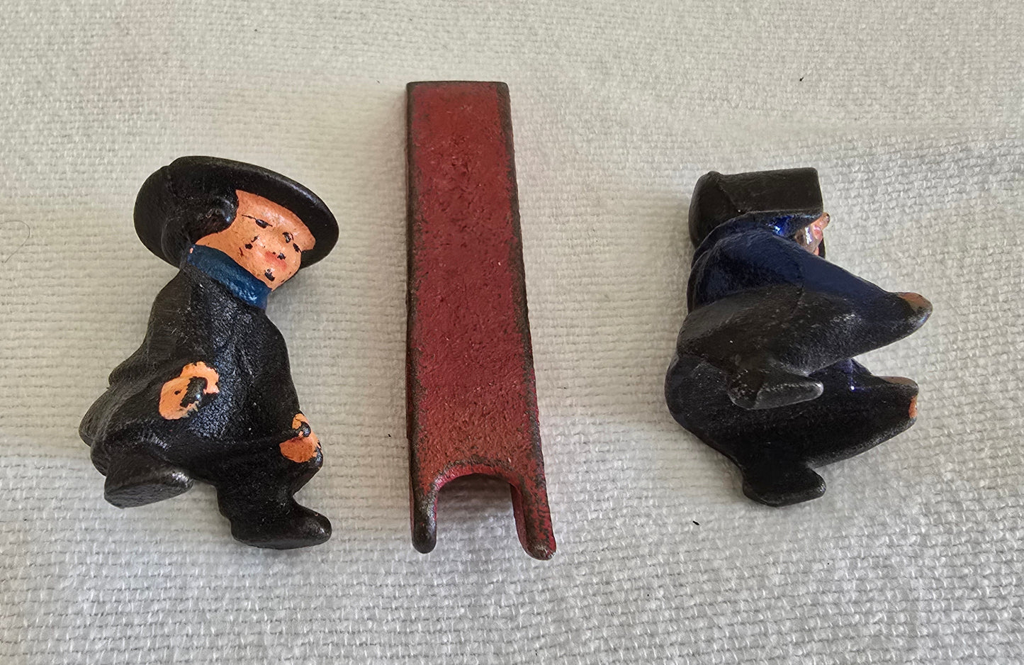 Vintage Cast Iron Amish Boy and Girl on Sled Toy Figurine