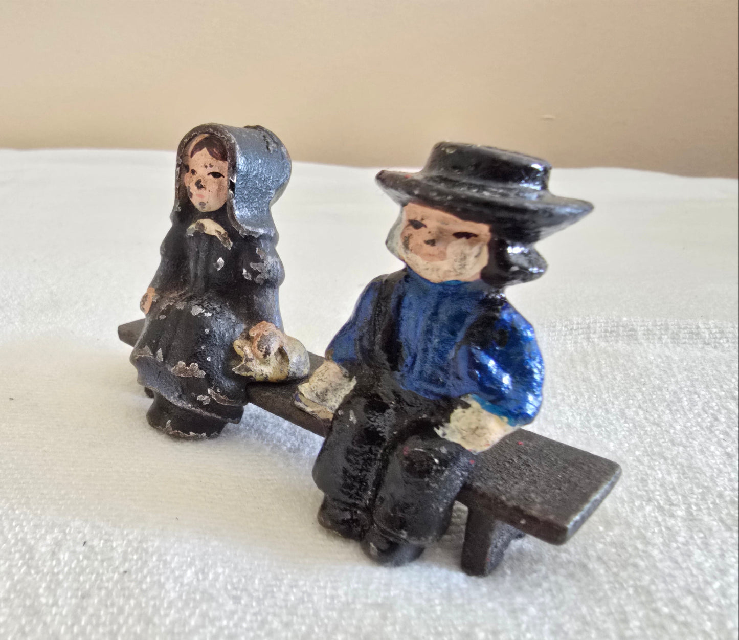 Vintage Cast Iron Amish Man and Woman on Bench