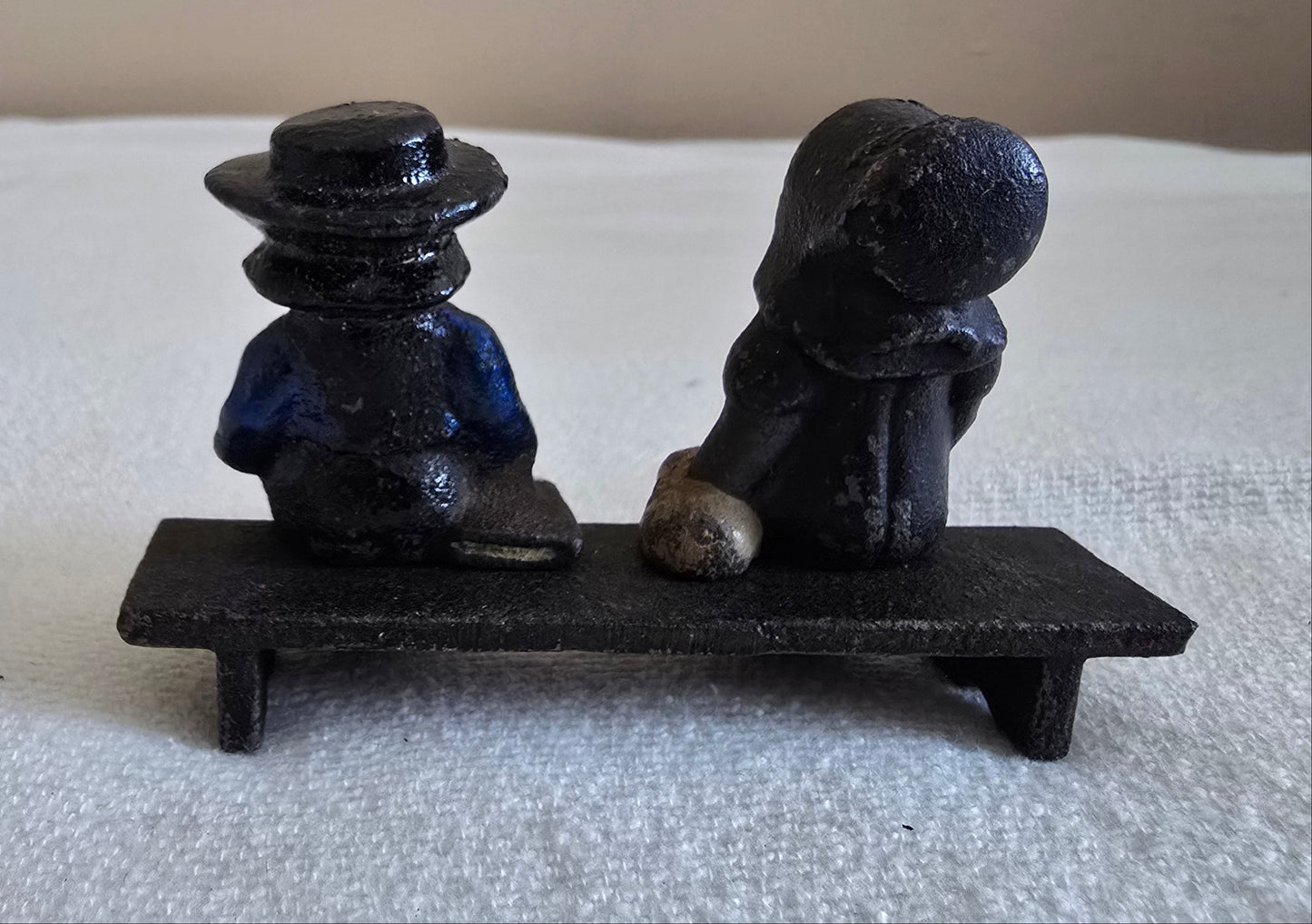 Vintage Cast Iron Amish Man and Woman on Bench