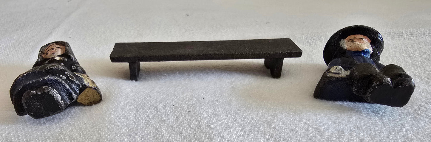 Vintage Cast Iron Amish Man and Woman on Bench