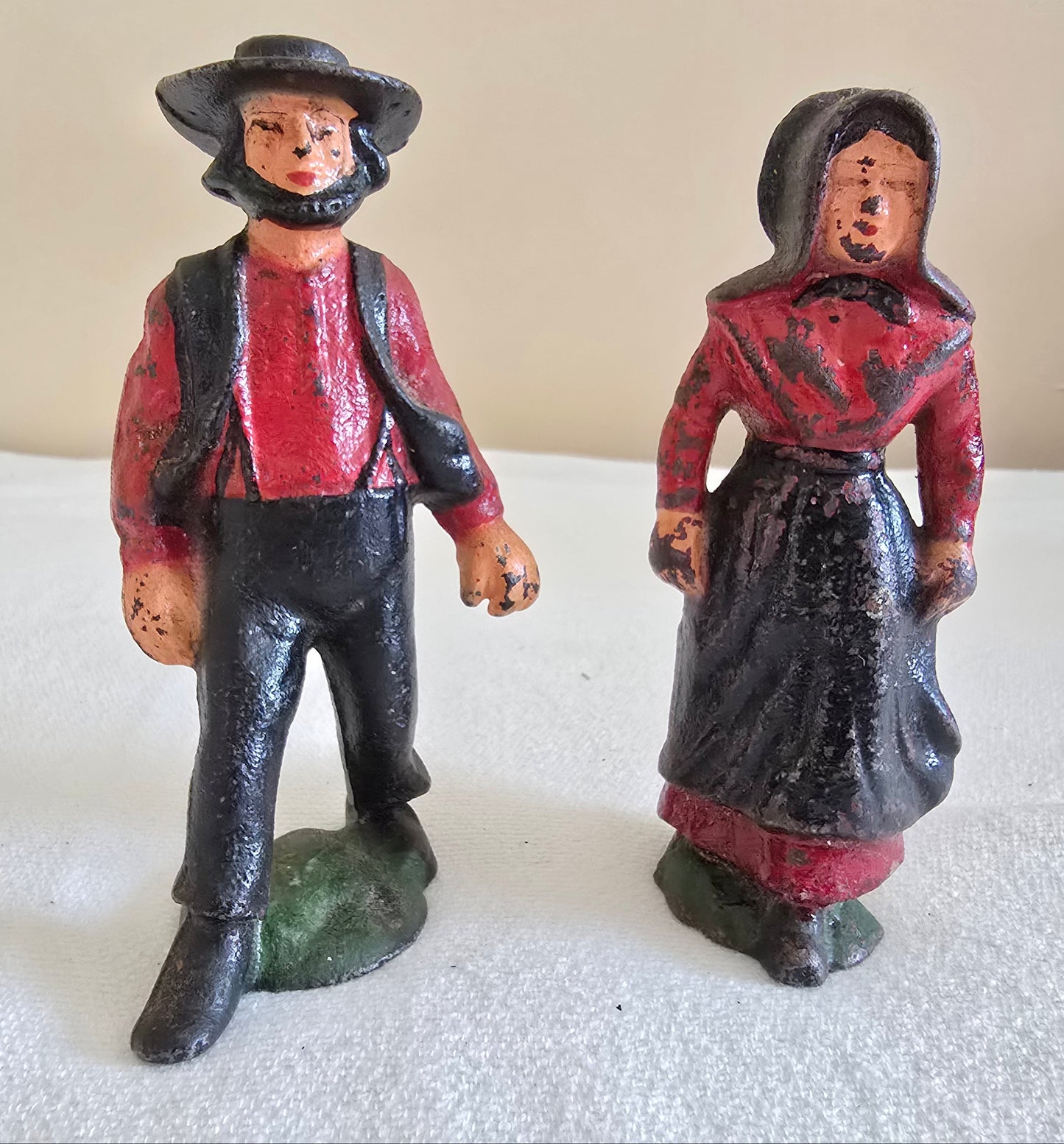 Vintage Cast Iron Amish Family Man and Woman Figurines with Miniature Boy and Girl Children Sitting