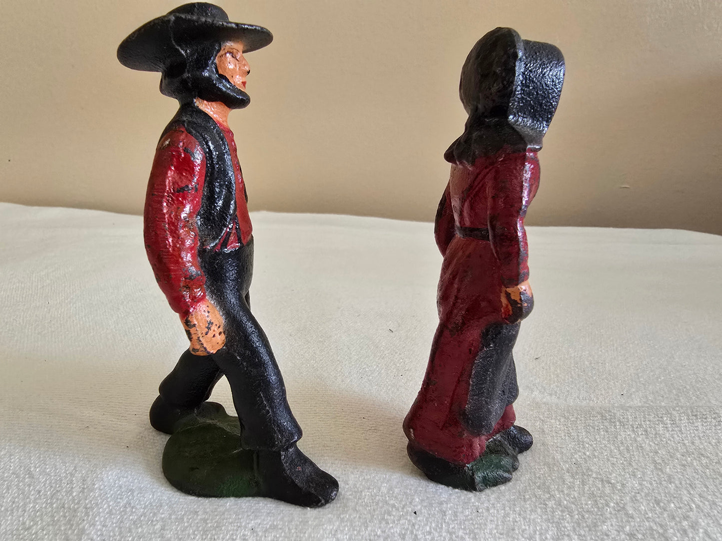 Vintage Cast Iron Amish Family Man and Woman Figurines with Miniature Boy and Girl Children Sitting