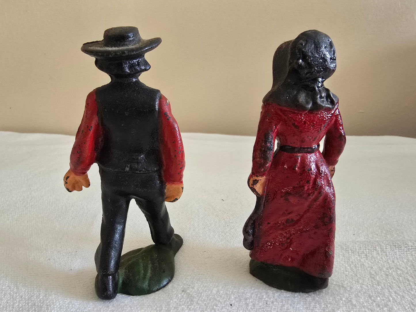 Vintage Cast Iron Amish Family Man and Woman Figurines with Miniature Boy and Girl Children Sitting