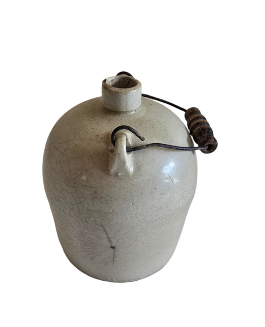 antique stoneware crock jug with wooden handle