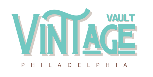 Vintage Vault Philadelphia logo with teal and beige text on a white background